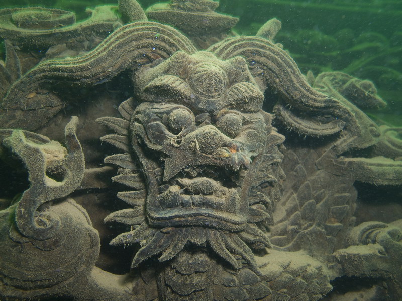 Carving on building submerged in Lake Qian Dao