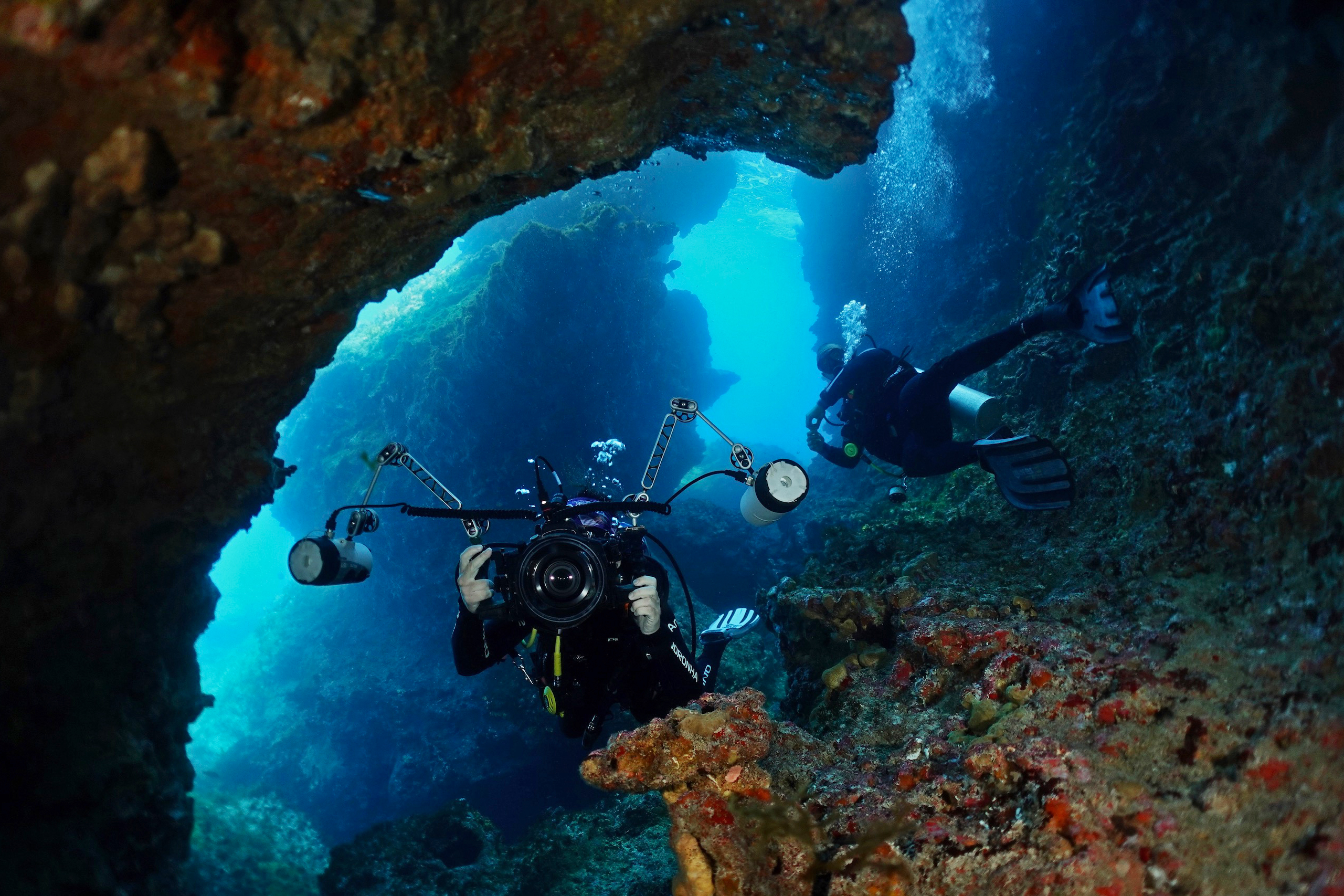 Divers in a cave at Ilha do Meio. Photo by Pierre Constant