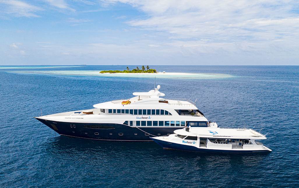 Maldives Blue Force One liveaboard, with dhoni attached, in the Maldives 