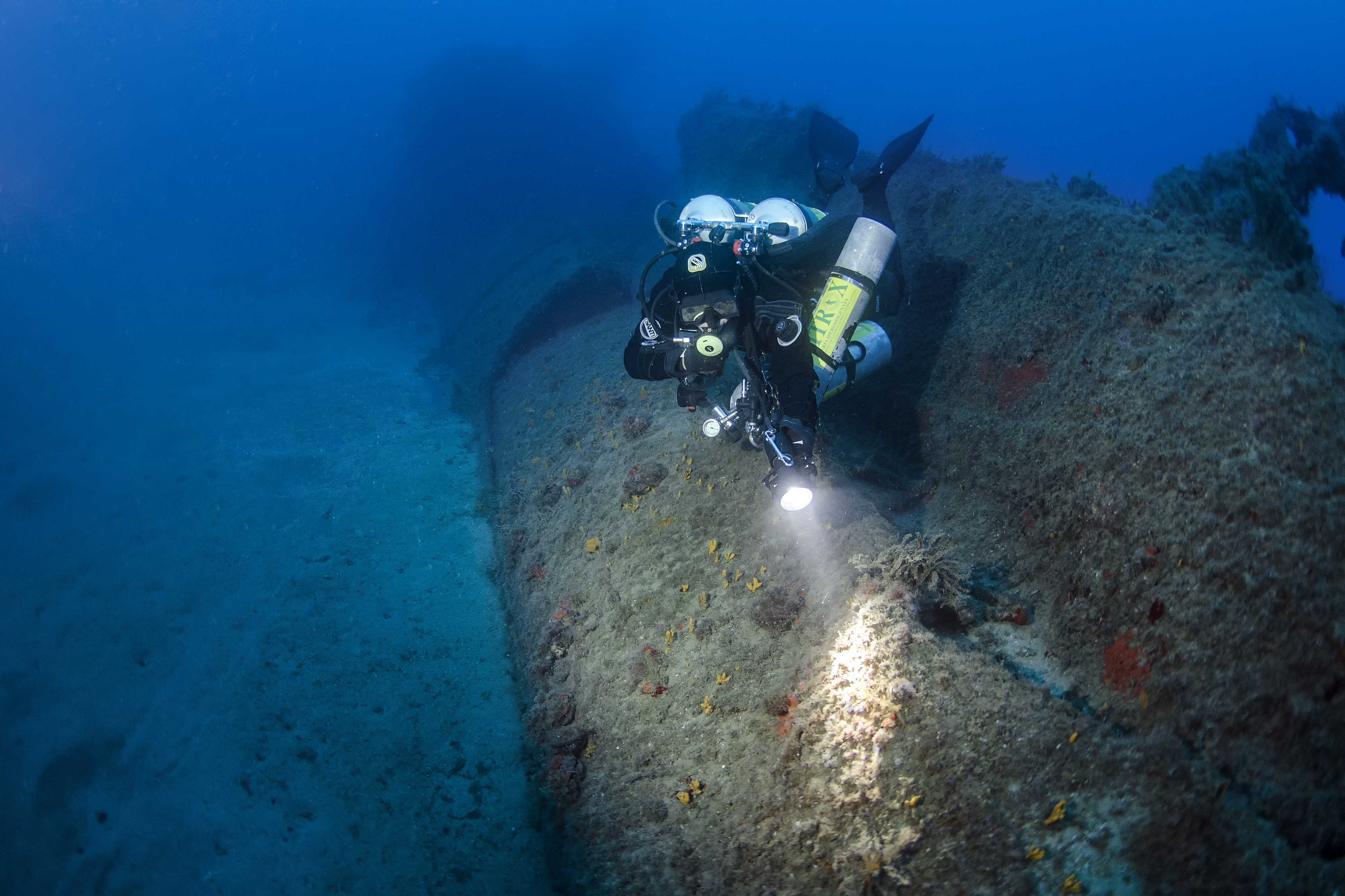 IANTDExpeditions diver on the Scirè submarine wreck. Photo by A. Dabalà / IANTD S.r.l.