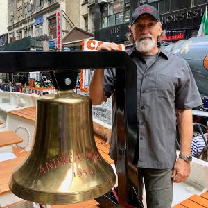 Moyer, with the ship’s bell on Columbus Day in New York City
