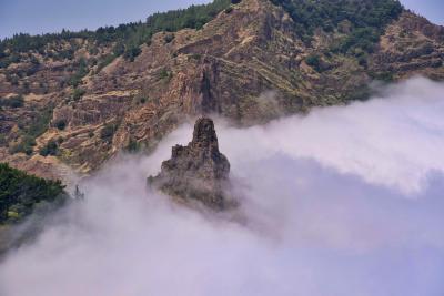 Volcanic pinnacle in the morning mist, Vale de Paul. Photo by Pierre Constant.