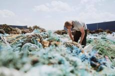 Recovered ghost fishing net can be processed into yarn or carpet
