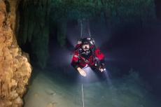 Cave diver in Cenote Tak Be Luum near Tulum, Mexico