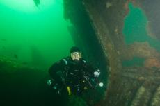Diver Olga Torrey exploring the USS San Diego