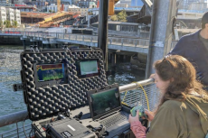 University of Florida biologist Karly Cohen operating the ROV from a pier in Seattle