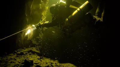 Diver places a cookie, 74m, in Stjernheim’s shaft. Photo by Anders Etander