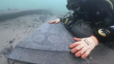 Diver with gravestone