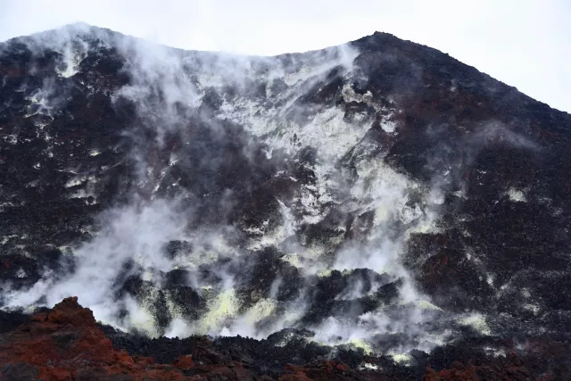 Solfataras, volcanic steam vents with sulfur gases, inside Tavurvur volcano, Rabaul 