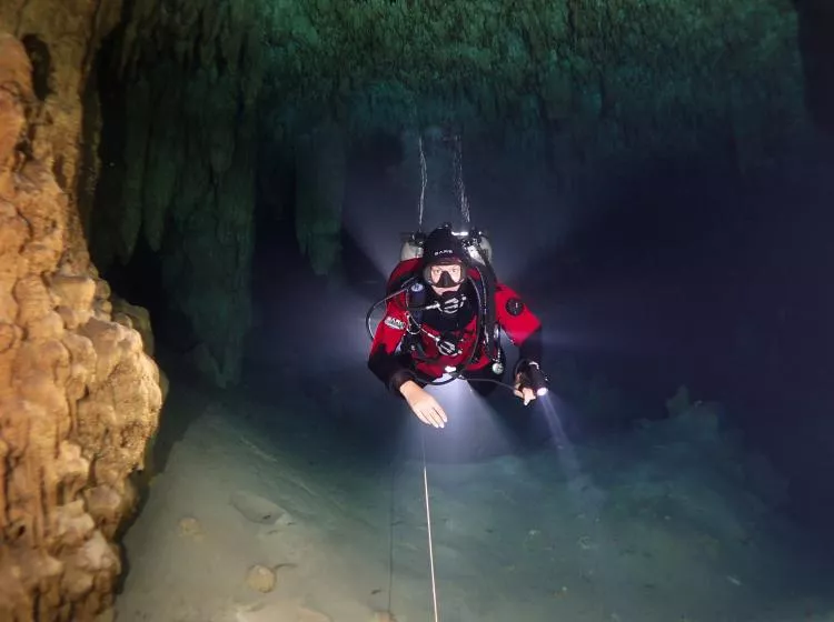 Cave diver in Cenote Tak Be Luum near Tulum, Mexico