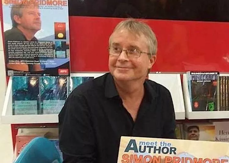 Author Simon Pridmore at a book signing of his books
