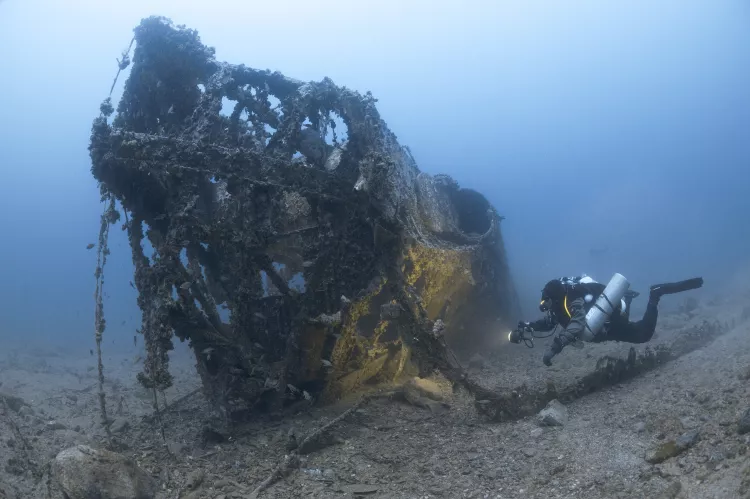 The wreck of a German Schnellboot, a fast-attack torpedo boat, resting at 65m. The wreck is covered in ammunition, depth charges and the torpedo tubes are still loaded. Photo by Steve Jones