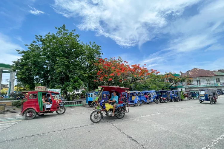 The “town square” in the heart of Romblon Town, with its vibrant “taxi rank” of tricycles. Photo by Kate Jonker