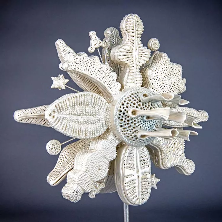 Flourish, by Marguerita Hagan. Hand-built ceramic, steel, silver leaf, 10 x 11 x 7in